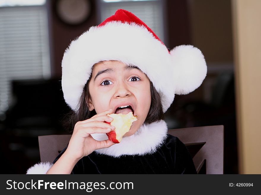 Sweet and cute girl eating apple. Sweet and cute girl eating apple