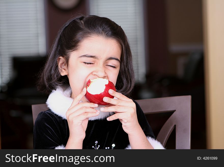 Girl Eating Apple And Enjoying