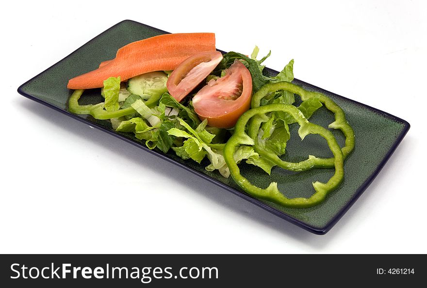 Garden salad isolated on white background.