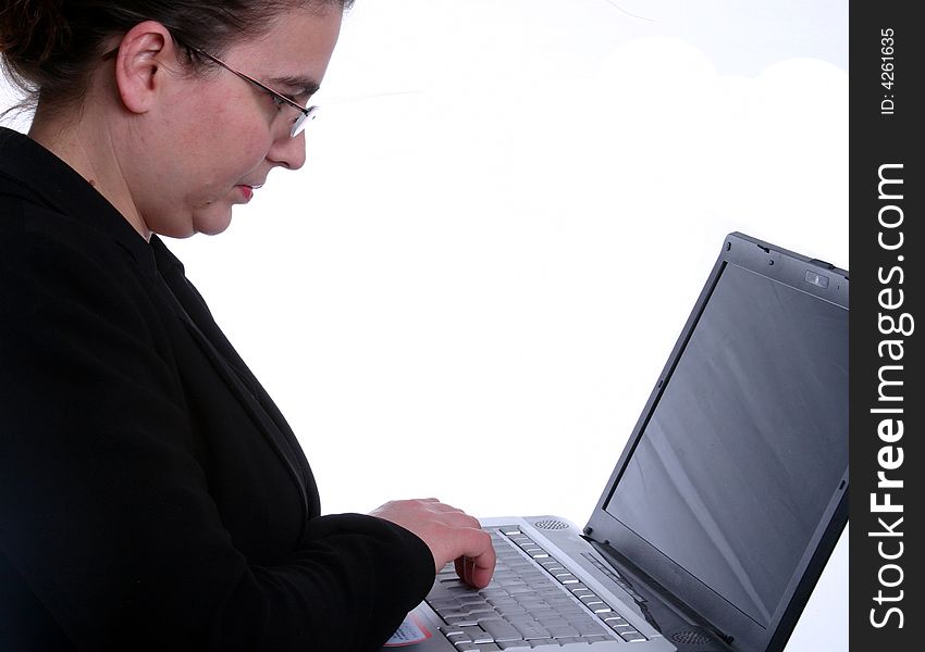 A businesswoman working on her laptop