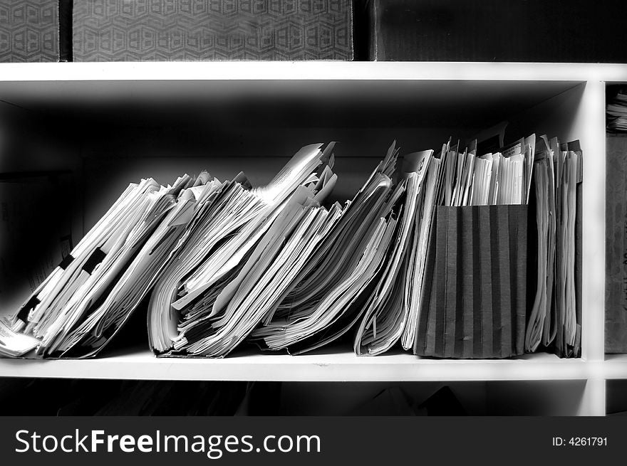 Office shelves full of files and boxes. Office shelves full of files and boxes