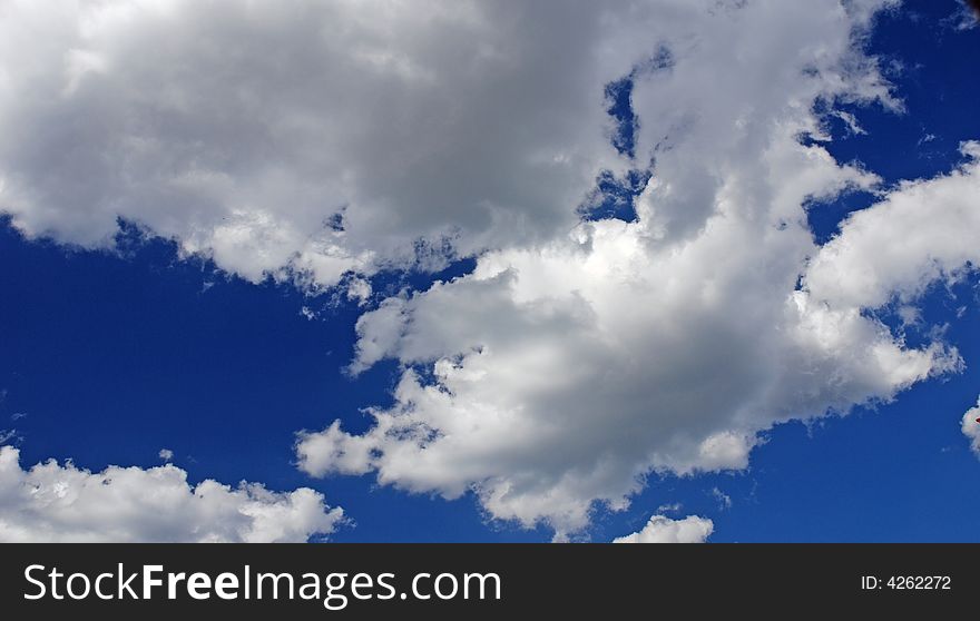 Beautiful white clouds in the blue sky