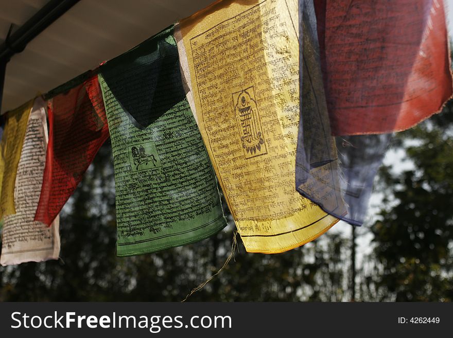 Buddhist prayer flags colorful against sky