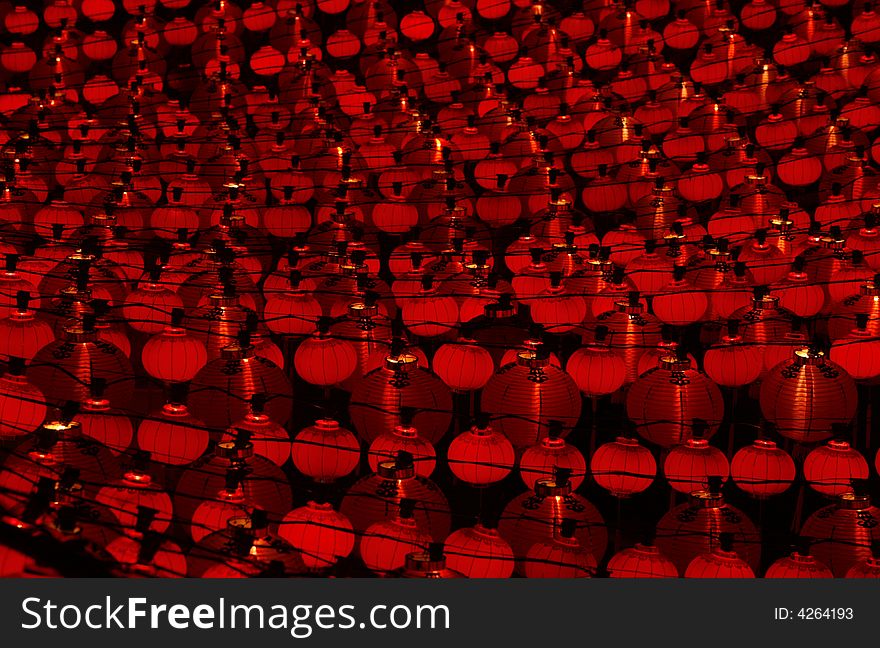 Chinese red lanterns hanging in rows. Chinese red lanterns hanging in rows.