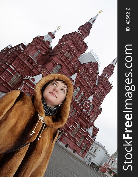 The girl in the Red square in winter