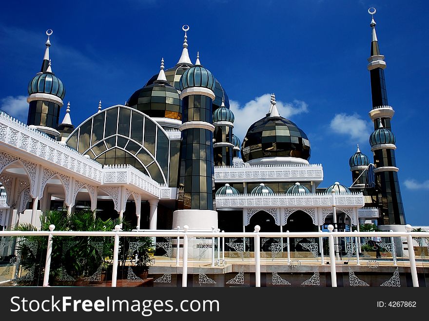 Mirror mosque on the blue sky background