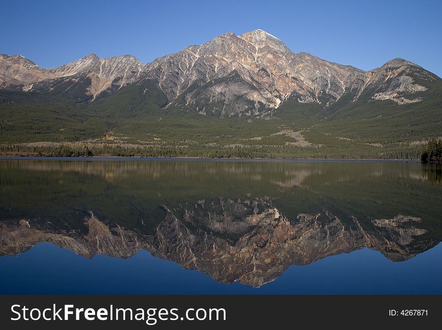 Pyramid Mountain reflected in Pyramid Lake.