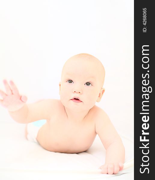 Funny little baby on white