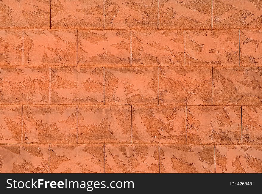 Orange stone wall texture, background