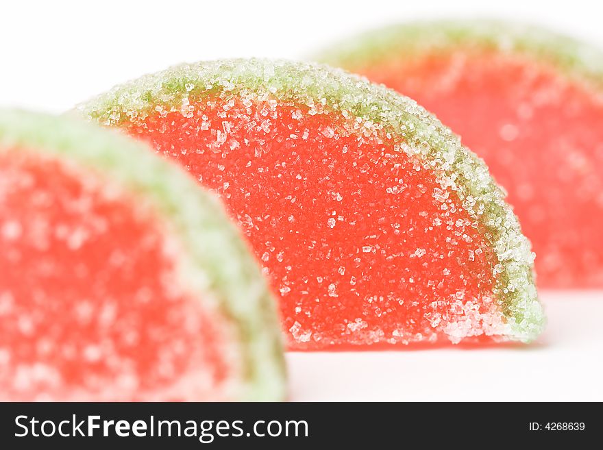 Close-up of fruit flavored jelly candies covered with sugar, shallow dof. Close-up of fruit flavored jelly candies covered with sugar, shallow dof.