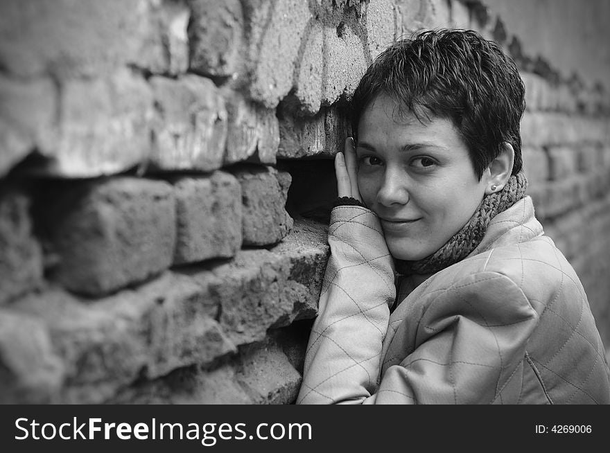 A view with a girl having a beautiful smile. Outdoor.