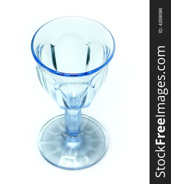 Blue glass goblet on white. Blue glass goblet on white
