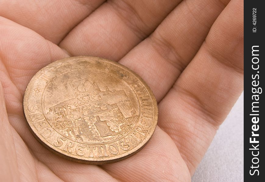 Old Coin on the palm