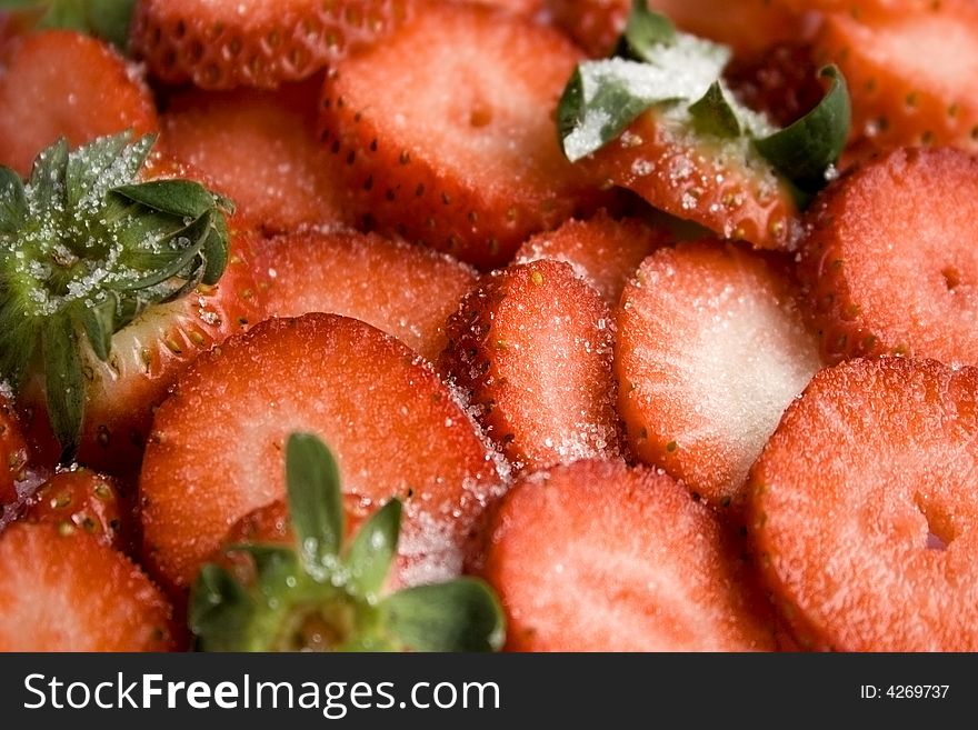 Slides of strawberries with sugar