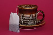 Cup And Tea Bag On Red Royalty Free Stock Photo Cup And Tea Bag On Red Royalty Free Stock Photo