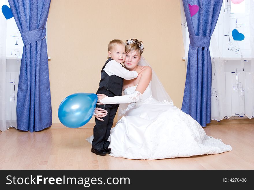 The bride embraces her little brother