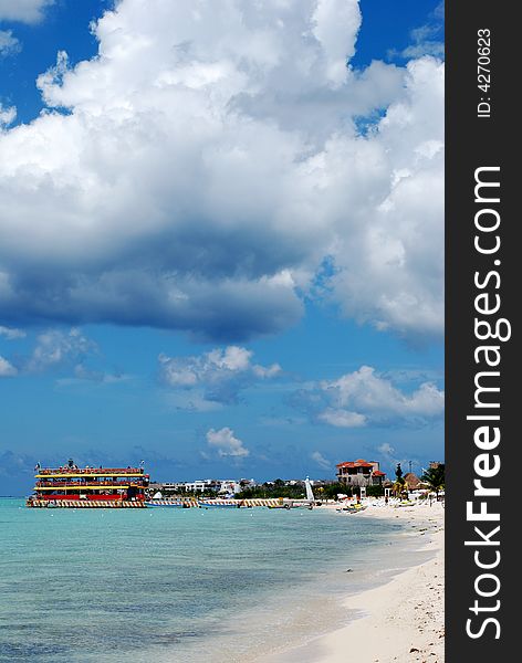 Clouds over Playa Mia beach on Cozumel island, Mexico. Clouds over Playa Mia beach on Cozumel island, Mexico.