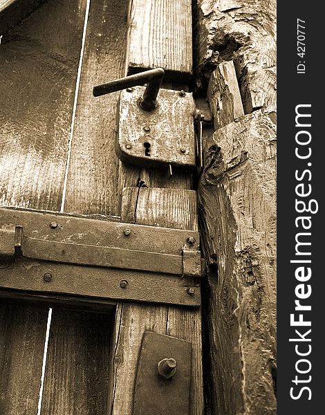 Close-up of an ancient and rusty door (vintage). Close-up of an ancient and rusty door (vintage)