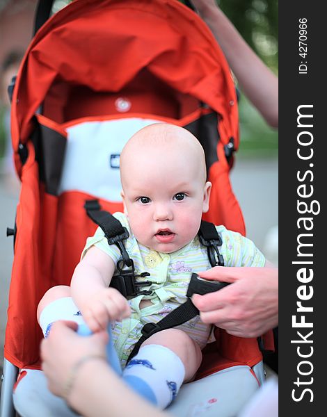 Baby in sitting stroller #3