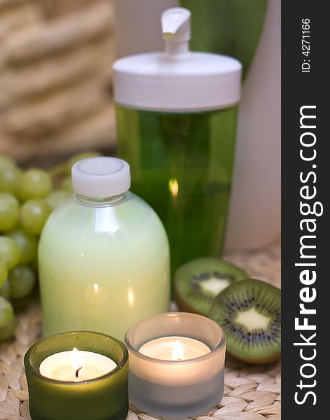 Decoration consisting of cosmetic bottles, some kiwis and candles. Green as dominating color. MORE SPA COMPOSITIONS Â». Decoration consisting of cosmetic bottles, some kiwis and candles. Green as dominating color. MORE SPA COMPOSITIONS Â»