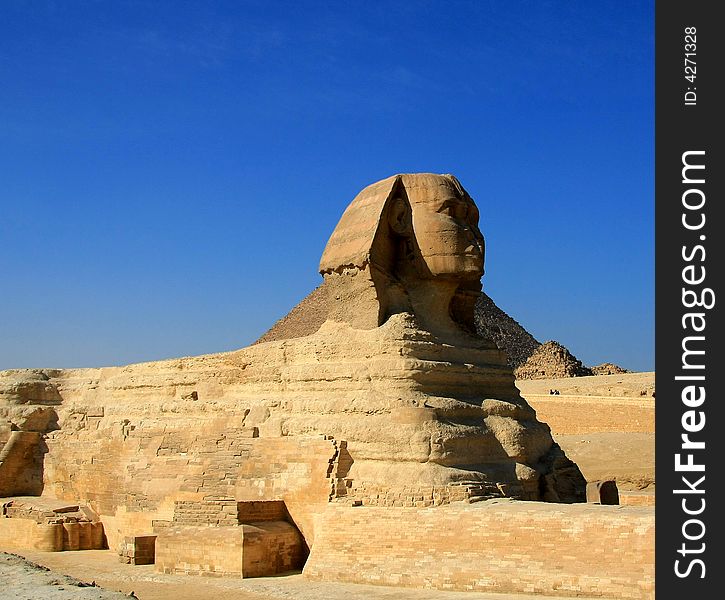 Sphinx in Giza area, Cairo, with Kufu pyramid in the behind