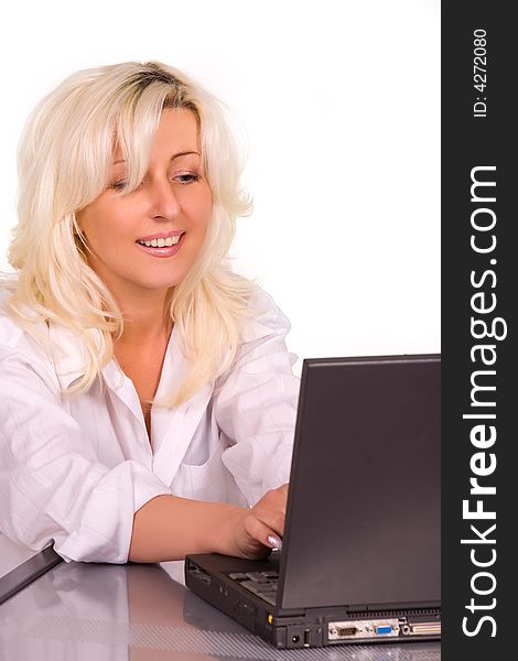 Blond caucasian model with laptop over white