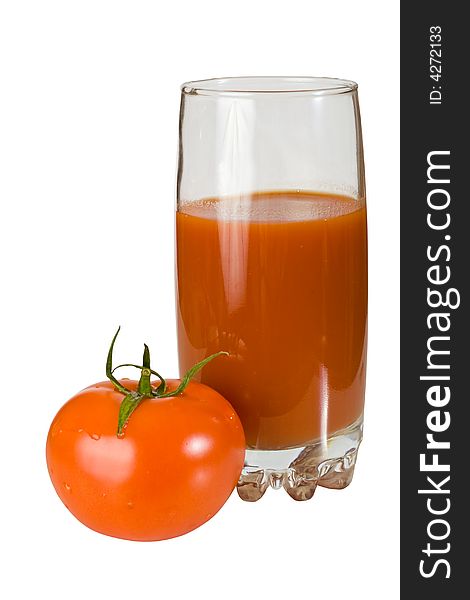 Tomato and glass of tomato juice isolated on white