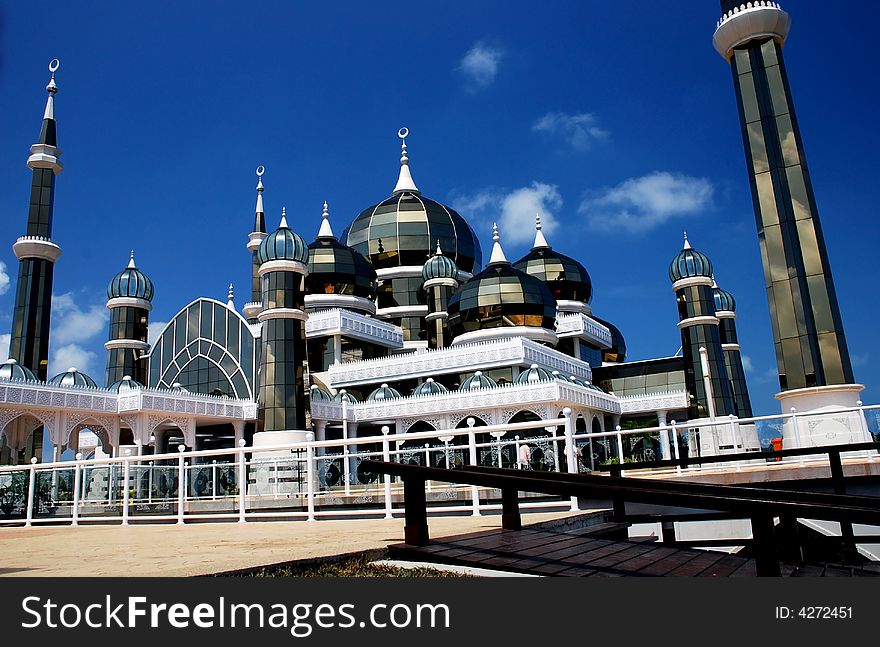 Mirror mosque on the blue sky background