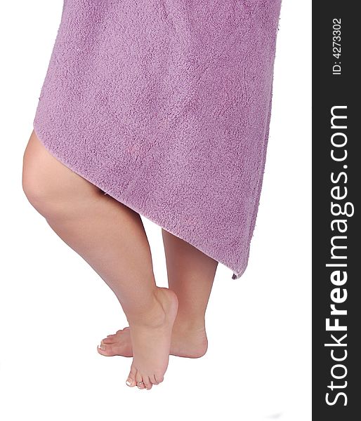 Woman steps out of the shower and wraps the towel around her. Woman steps out of the shower and wraps the towel around her.