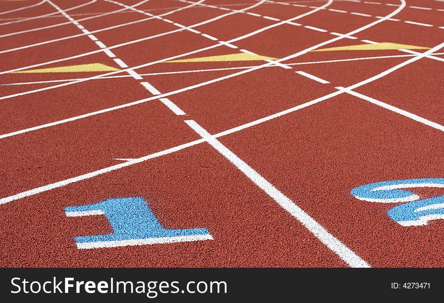 A picture of a track and field venue. A picture of a track and field venue