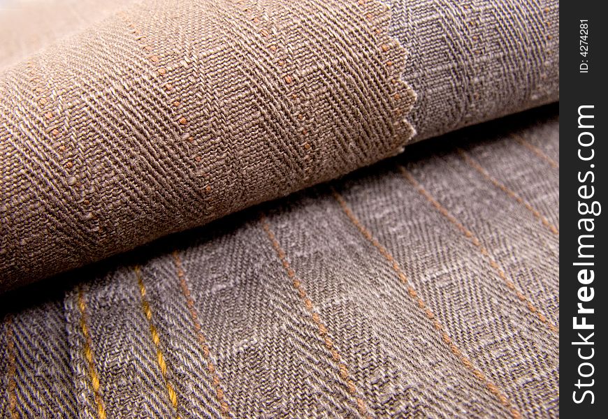 Textile brown denim cotton texture in diagonal form. Textile brown denim cotton texture in diagonal form