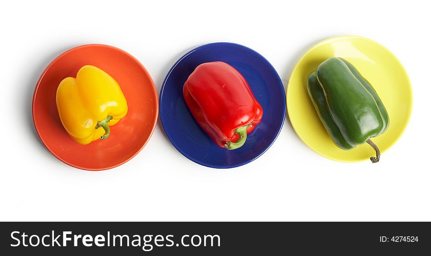An image of color vegetables on a saucers. An image of color vegetables on a saucers