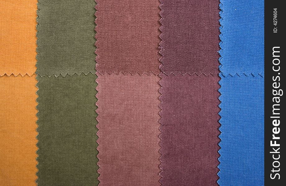 Textile denim samples in diagonal form. Textile denim samples in diagonal form