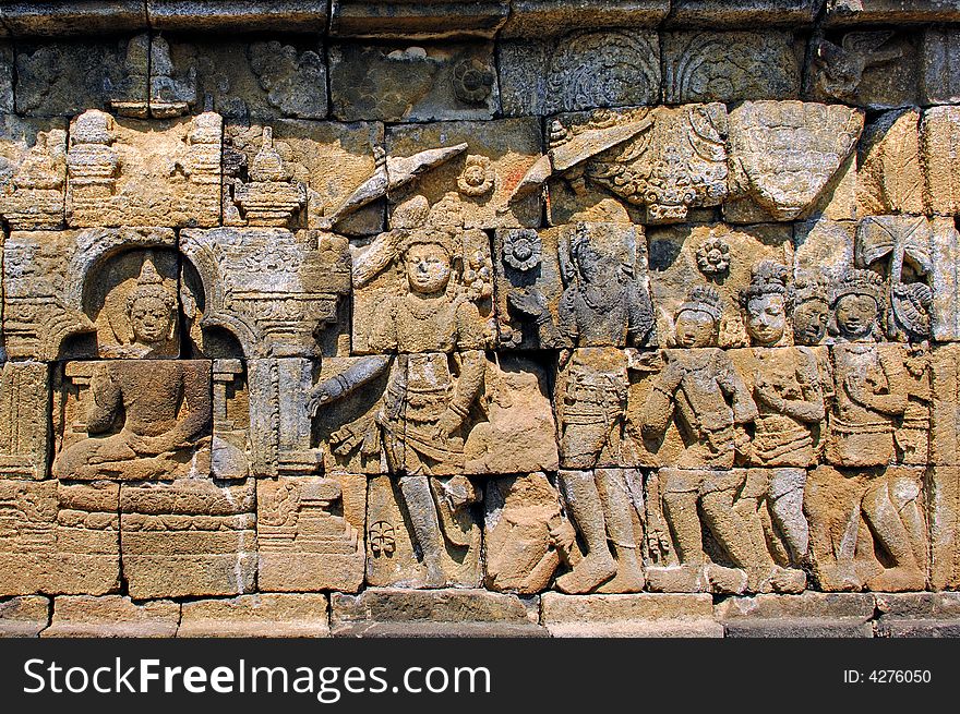 The carved images of borobudur temple; the most famous buddhist  bas- relief of  southeast asia ; the life of buddha. The carved images of borobudur temple; the most famous buddhist  bas- relief of  southeast asia ; the life of buddha