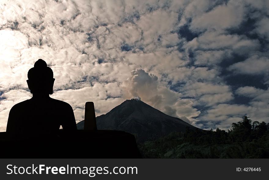 Indonesia, Java: Merapi eruption, may 2006, and buddha in meditation