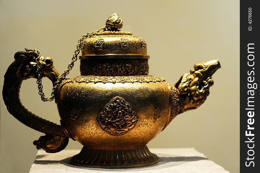 Metal vessel with religionary pattern