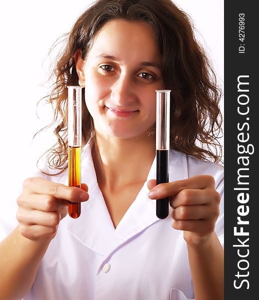 Scientist using test tubes and smiling. Scientist using test tubes and smiling