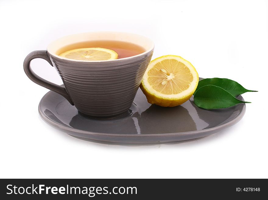 Cup of tea with a lemon