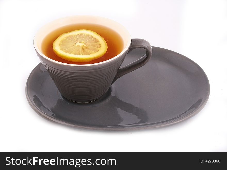 Cup of tea with a lemon