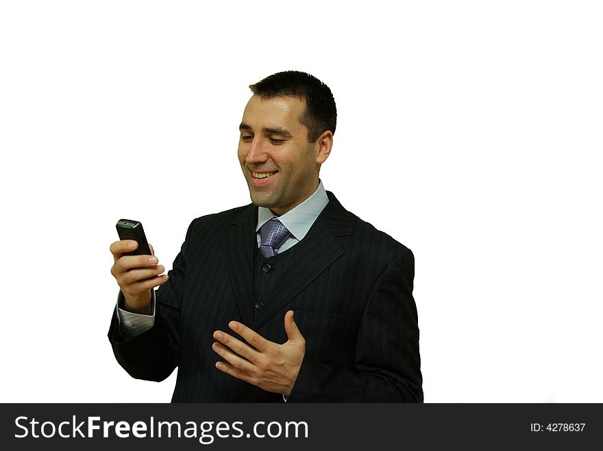 A man, holding a cellular phone in his hands, smiling. A man, holding a cellular phone in his hands, smiling