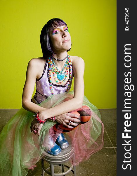Pretty young woman with colorful punk clothes. Pretty young woman with colorful punk clothes.