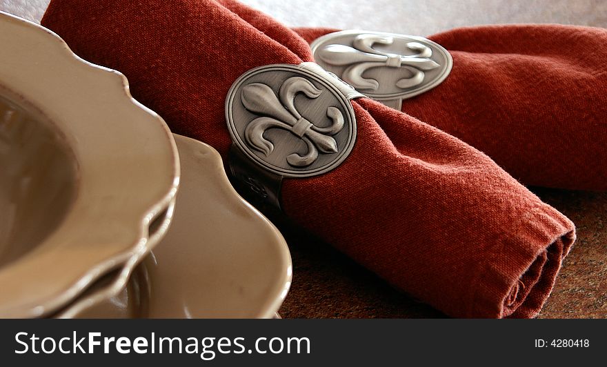 Dinner napkins wrapped up in Quebec's National symbol - the Fleur de Lys