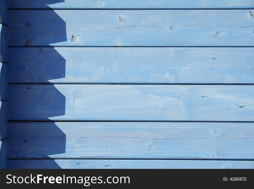 Blue wooden wall pattern with shadows. Blue wooden wall pattern with shadows