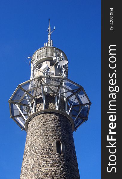 Old tower with new equipment for telecommunication