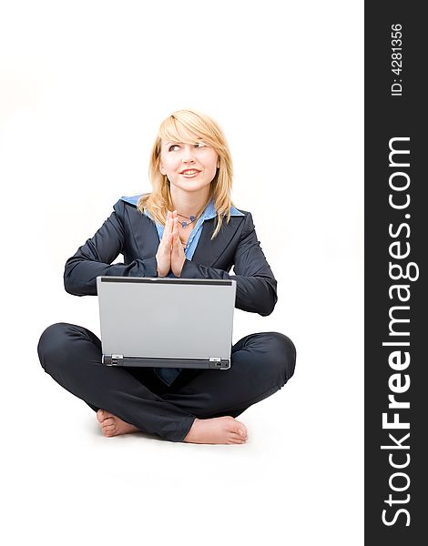 Shoeless woman with laptop do meditative exercises
