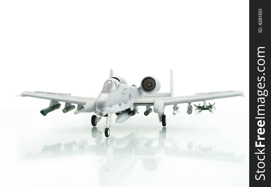 Military miniature toy airplane on white background. Military miniature toy airplane on white background