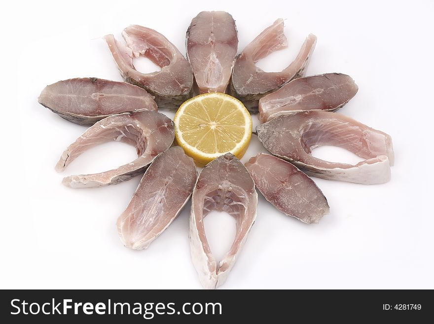 Slices of fish and lemon