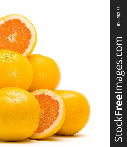 A pile of oranges on white background. A pile of oranges on white background