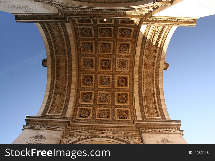 Arc de triomphe from a bottom view, Paris, France, with smart passing by. Arc de triomphe from a bottom view, Paris, France, with smart passing by