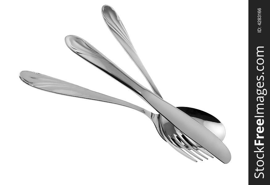 Set of kitchen object. The spoon, a fork, knife.Separately on a white background. Set of kitchen object. The spoon, a fork, knife.Separately on a white background.